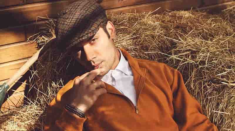 Caner Topçu wearing a orange shirt with a blueberry cap Takes the Lead in Kanal D Dönence turkish drama series teen